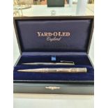 A silver Yard-O-Led pencil, cased with some paperwork items. Heavy, with engraved decorative detaili