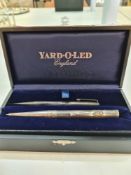 A silver Yard-O-Led pencil, cased with some paperwork items. Heavy, with engraved decorative detaili