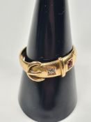 Antique 22ct yellow gold buckle ring set diamond and a ruby, marked 22. Birmingham 1881, maker possi