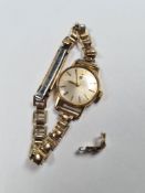 Vintage ladies 18ct gold cased Tissot watch, marked 750, on plated strap