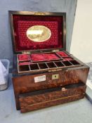 A Victorian burr walnut travelling box having removable tray with lower concealed writing slope