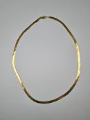 18ct gold flat link necklace, one side decorated with Starburst engraving, 47cm, approx 8.7g