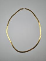 18ct gold flat link necklace, one side decorated with Starburst engraving, 47cm, approx 8.7g