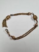 Unmarked yellow metal, Victorian German two rows ropetwist chain linked by balls, with lobster clasp