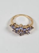 14ct yellow gold dress ring set with mixed cut tanzanites of cluster ring design, marked 14K, approx