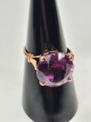 Egyptian Rose gold dress ring with large round cut amethyst in raised 4 claw mount, AF, stone loose,