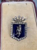 An antique silver backed brooch in the form of a crest, possibly Belgium Royal family crest, with bl