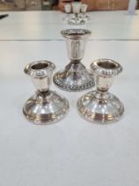 A pair of miniature silver candlesticks by S Blanckensee and Son Ltd., Birmingham 1938. 6cm high app