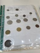 A small quantity of early 20th Century Chinese coinage, a folder of 20th Century GB coins and others