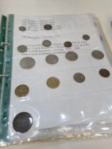 A small quantity of early 20th Century Chinese coinage, a folder of 20th Century GB coins and others