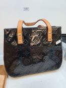 Louis Vuitton: A Louis Vuitton Reade handbag, with flat leather handles, an open top and an interior
