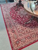 A modern Persian style rug having all over floral design, red ground 346cm x 250cm, and one other ru