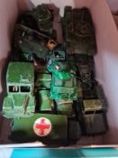A quantity of playworn military vehicles, mainly by Dinky, and a Binatone Black and White TV game