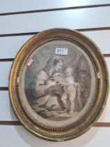 An antique oval Bartolozzi print of Mother and Child in gilt frame