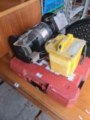 A selection of tools including Hilti ZE22, manhole cover and bench grinder and a 110 Transformer box