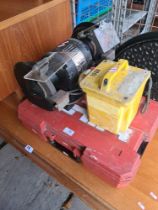 A selection of tools including Hilti ZE22, manhole cover and bench grinder and a 110 Transformer box