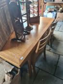 A wooden table and chairs