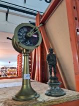 A model brass Ship's engine room telegraph and a bronzed figure of boy with hands in pockets