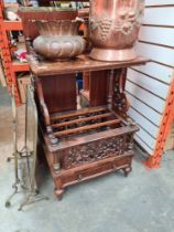 A Victorian Walnut Canterbury with raised back and pierced decoration