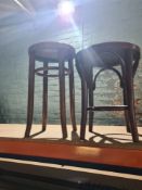 Two bentwood stools and a cane seated stool