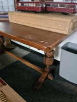 A reproduction oak oblong refectory table, 153cm