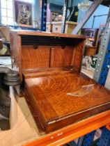 A vintage writing slope and organiser, 2 vintage telephones and a seal