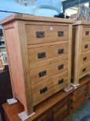 A pair of modern oak 4 drawer chests