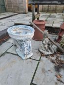 Three chimney pots and concrete garden ornaments i.e. gnomes and a house