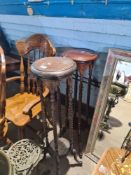 Two reproduction plant stands and 2 items of brassware