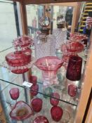 A quantity of glassware including Cranberry glass and a silver collared decanter with silver Whisky