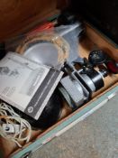 A Russian portable autofocus enlarger, a briefcase of optical lenses and a projector