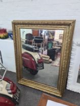 A Victorian gilt framed mirror having Greek key border, 125cm