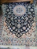 Five various rugs including a modern Persian style with floral decoration