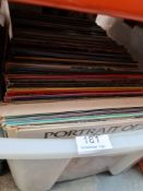 Four cartons of vinyl LPs and 7" singles, mixed genres