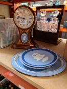 A Comitti Edwardian style mantle clock with Wedgwood Jasperware plaque and 3 Wedgwood plates