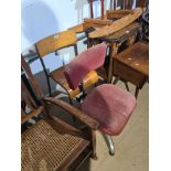 An Industrial revolving chair and one other child's chair