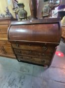 A late 19th Century cylinder bureau, probably French having 3 long drawers