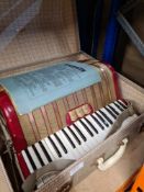 Piano Accordion in case, made by Hohner
