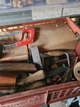 Selection of vintage hand tools including planes, chisels, etc