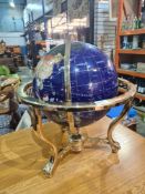 A modern mineral specimen globe on gilt stand