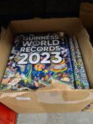 A large selection of books, albums including Guiness Books of World Records