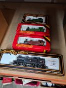 A Main Line 00 Gauge locomotive N2 Class, one other Tank loco and two similar Hornby examples