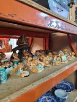 A quantity of Pendelfin figures, a Pendelfin harbour stand with rowing boat and one other of curios
