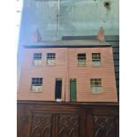 An old Dolls House in the style of two cottages