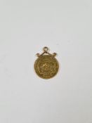 A 22ct gold Half Pond dated 1895 on 9ct gold mount