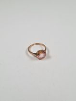 Unmarked rose gold dress ring set with round cut citrine, size N, approx 2.28g