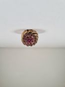 14K rose gold domed dress ring with circular panel set with round cut rubies, size K, approx 12.52g