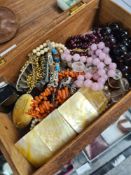 Carved box containing various hardstone necklace including quartz garnet etc, silver bracelets, etc