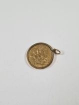 9ct gold mounted 22ct gold Full Sovereign, dated 1963, Young Elizabeth II and George and the Dragon,