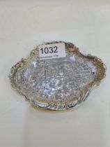 A decorative silver Victorian trinket dish, having ornate scene of the country. Hallmarked London 18